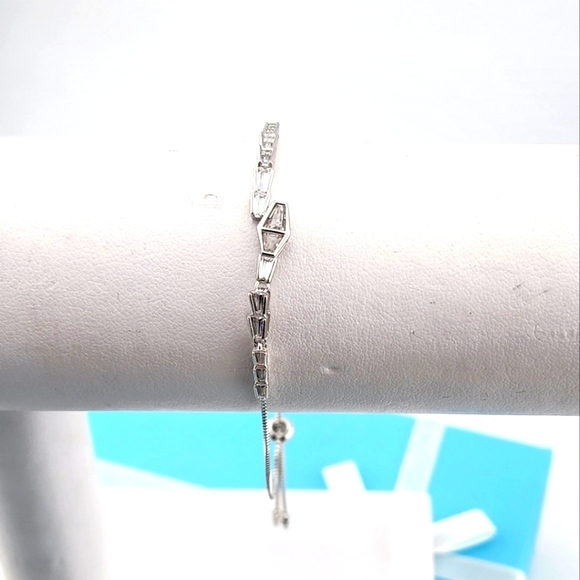 Elegant Silver Adjustable Bracelet Stamped 925 With Cubic Zirconia Stones